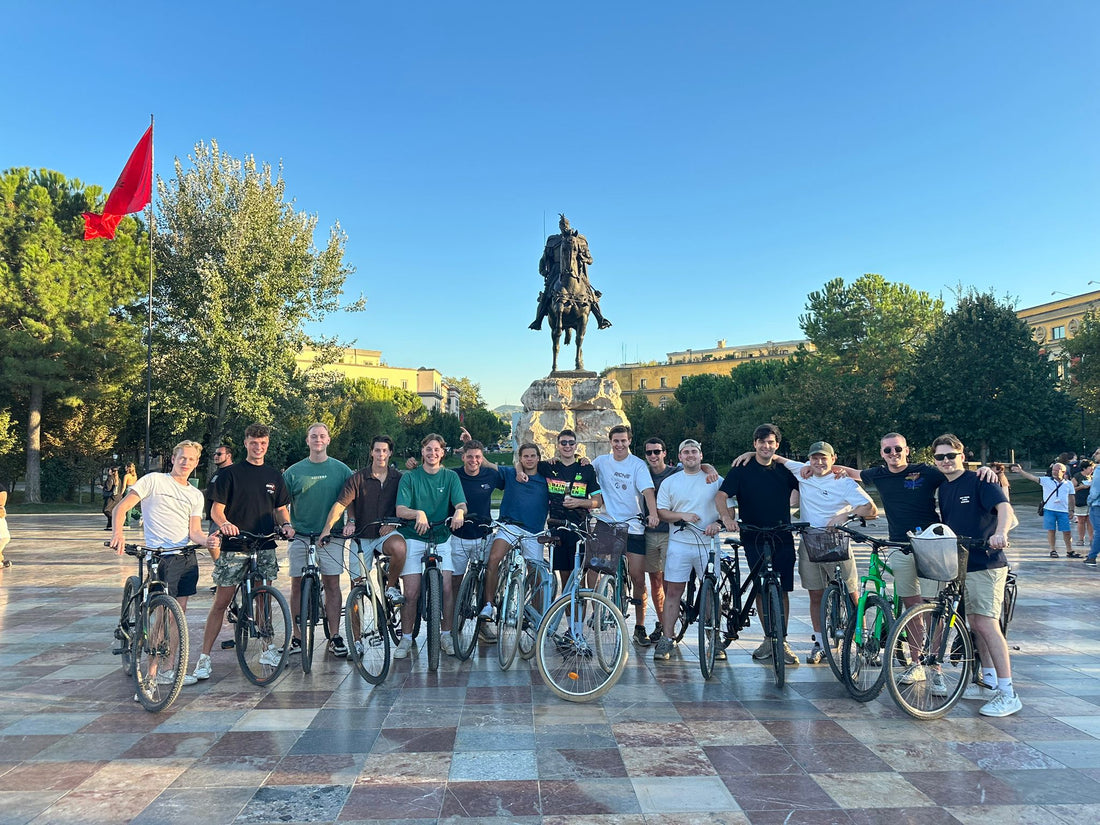 dutch tourists bike tour Tirana cycling the city center and lake park