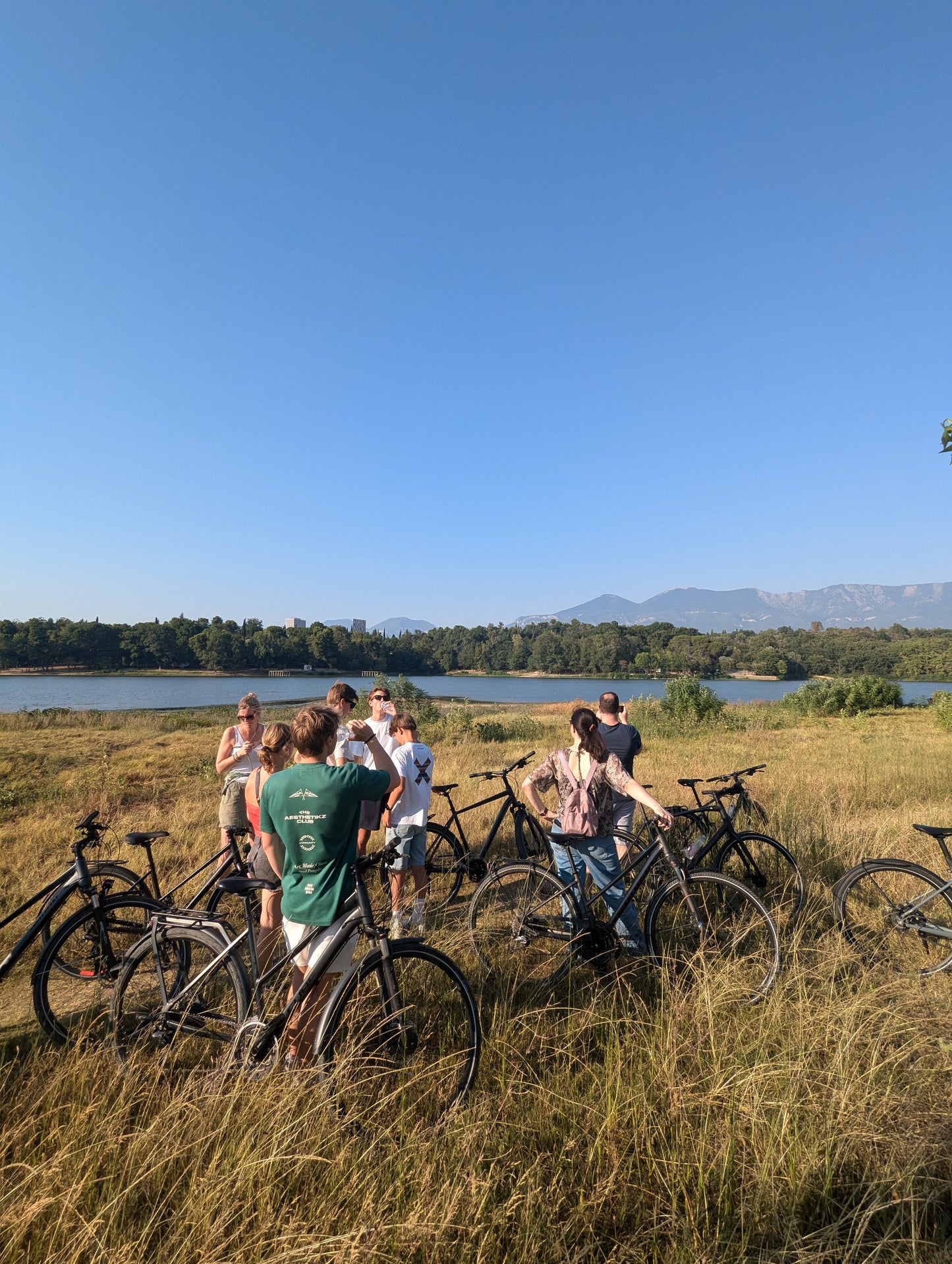 Group of people with bicycles in the big Lake Park tirana