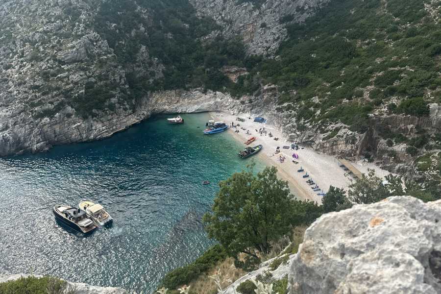 speed boat tour vlore day trip travel adventure summer beach fun tourism sea cave drone arial grama bay